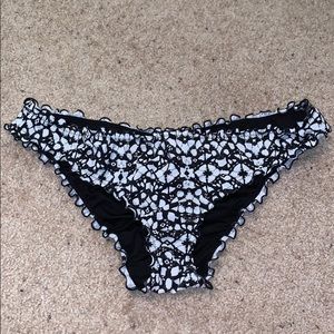 Black and white bikini bottom with cinched butt